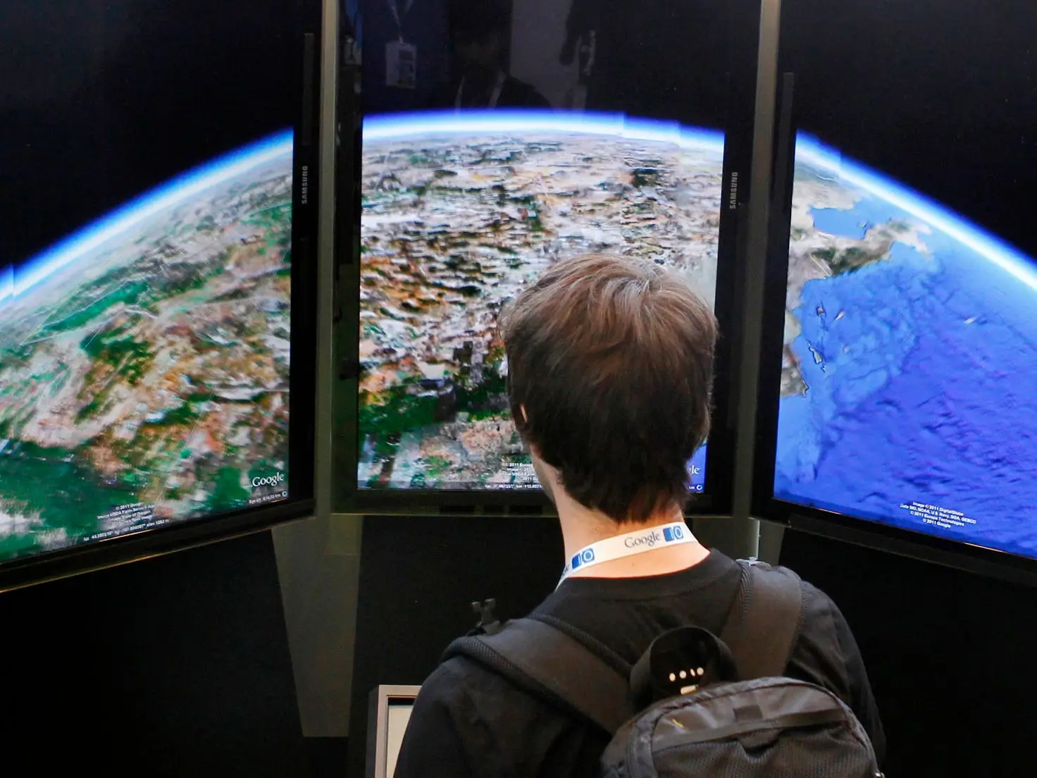 An attendee tries out the Google Earth demonstration at the Google I/O Developers Conference in the Moscone Center in San Francisco