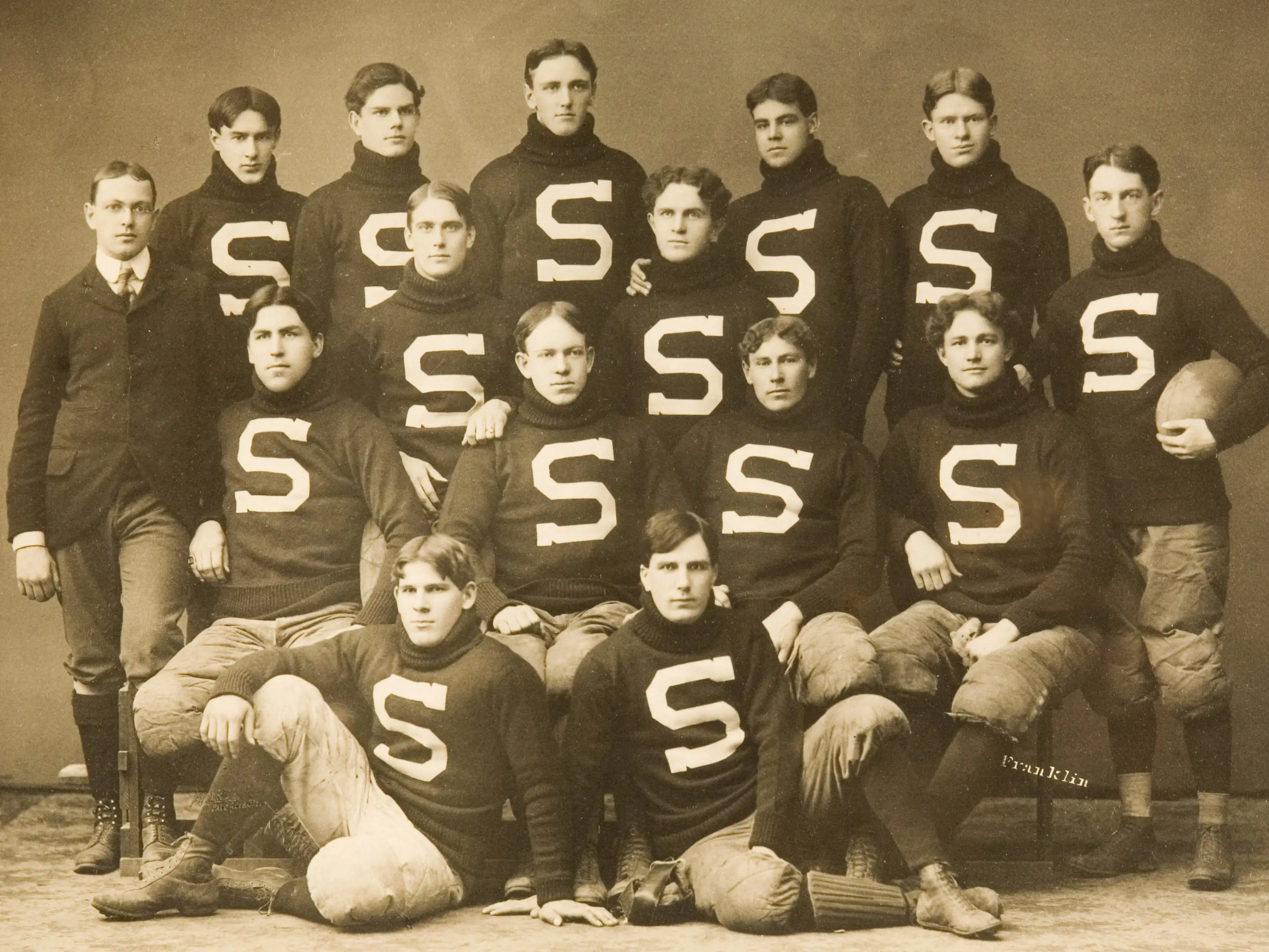 Team portrait of the Stanford University football team circa 1900.