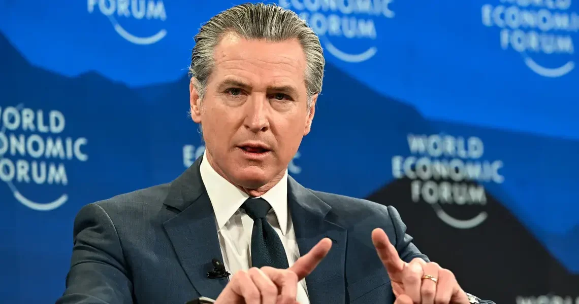 Gavin Newsom’s Davos trip mixed Trump criticism, a USA House snub, and bright-red kneepads