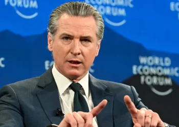 Gavin Newsom’s Davos trip mixed Trump criticism, a USA House snub, and bright-red kneepads
