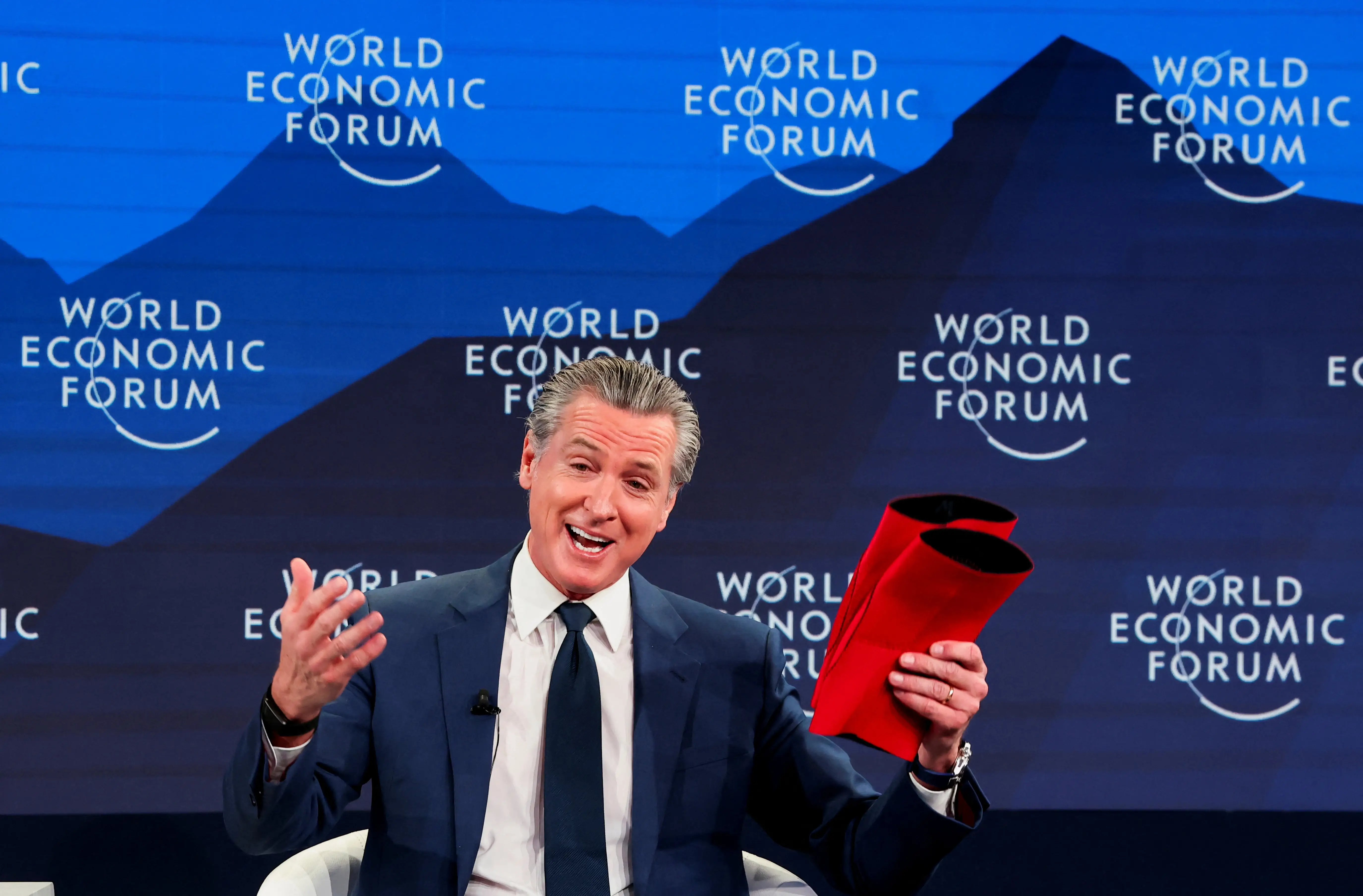 Gavin Newsom used knee protector props at Davos.