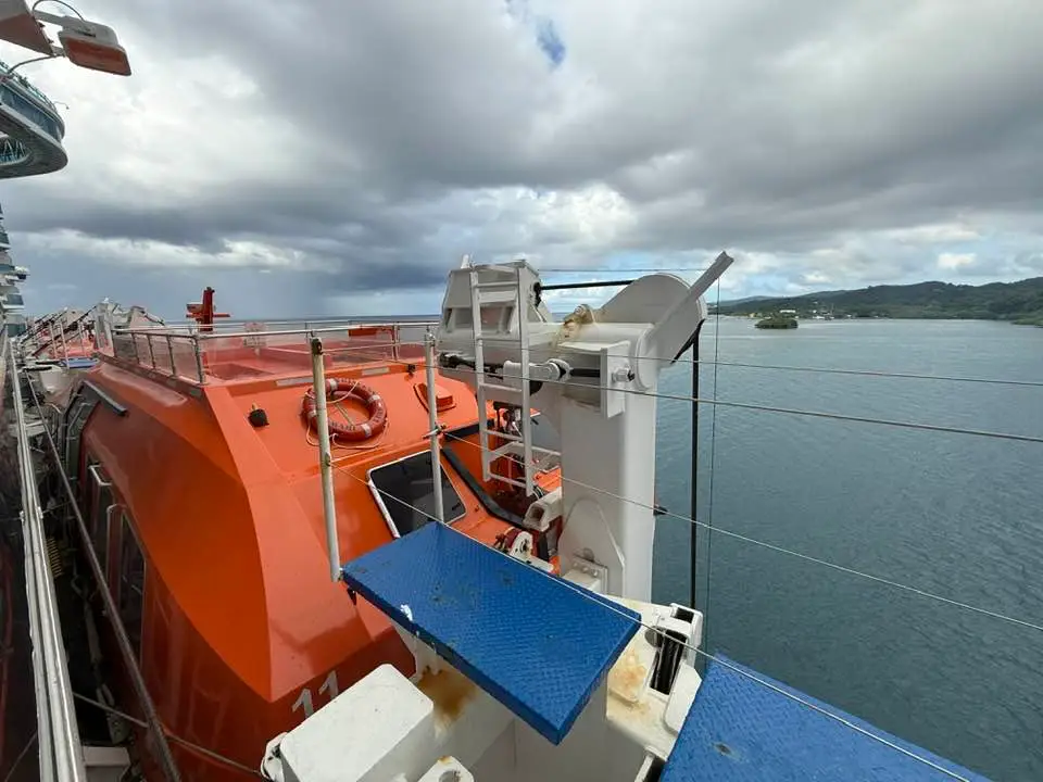 View off of balcony on Princess cruise with lifeboat blocking part of the view