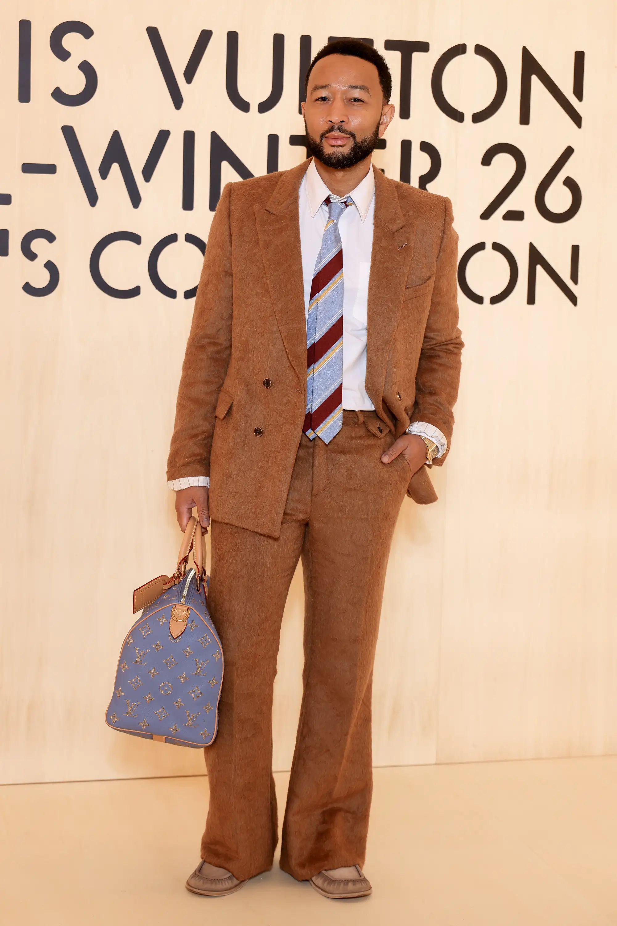 John Legend at a Louis Vuitton show during Paris Fashion Week Men's 2026.