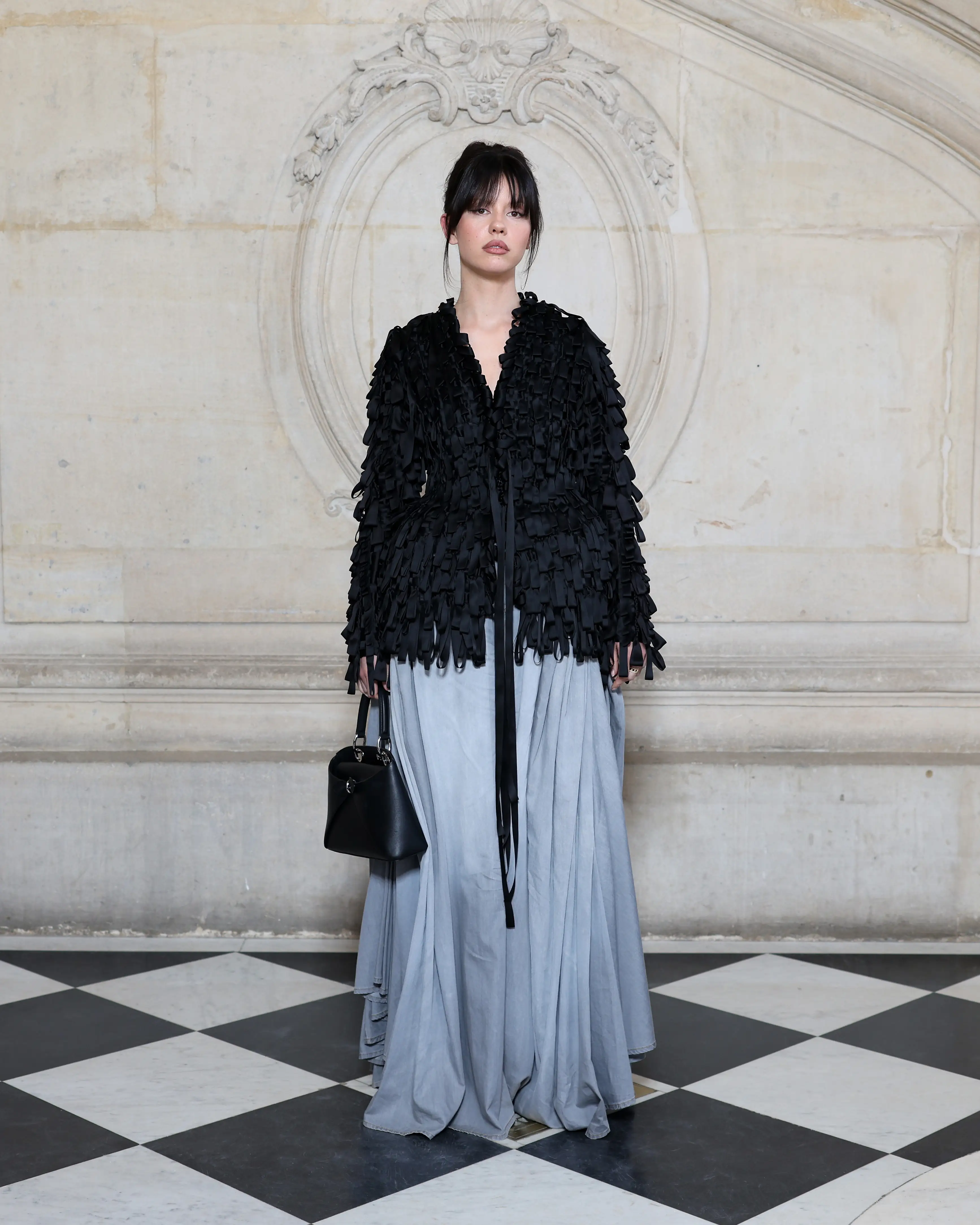 Mia Goth at a Dior show during Paris Fashion Week Men's 2026.