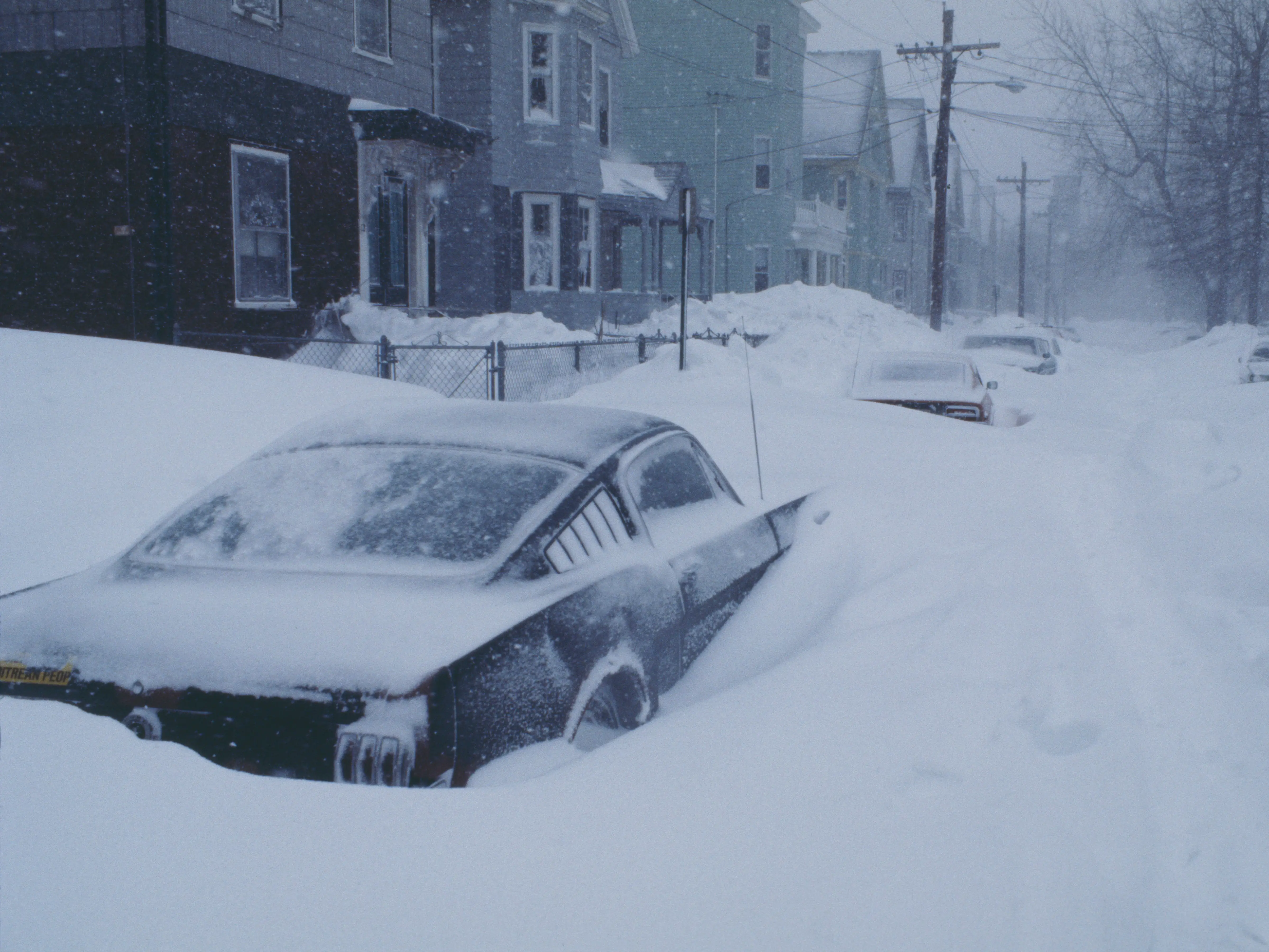 A snow-covered car on a street in Cambridge, Massachusetts, during the 'Blizzard of '78', February 1978.
