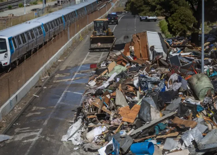 Head of LA homeless nonprofit charged with pocketing millions, splurging on luxuries including a Hermès jacket and a trip to Vegas