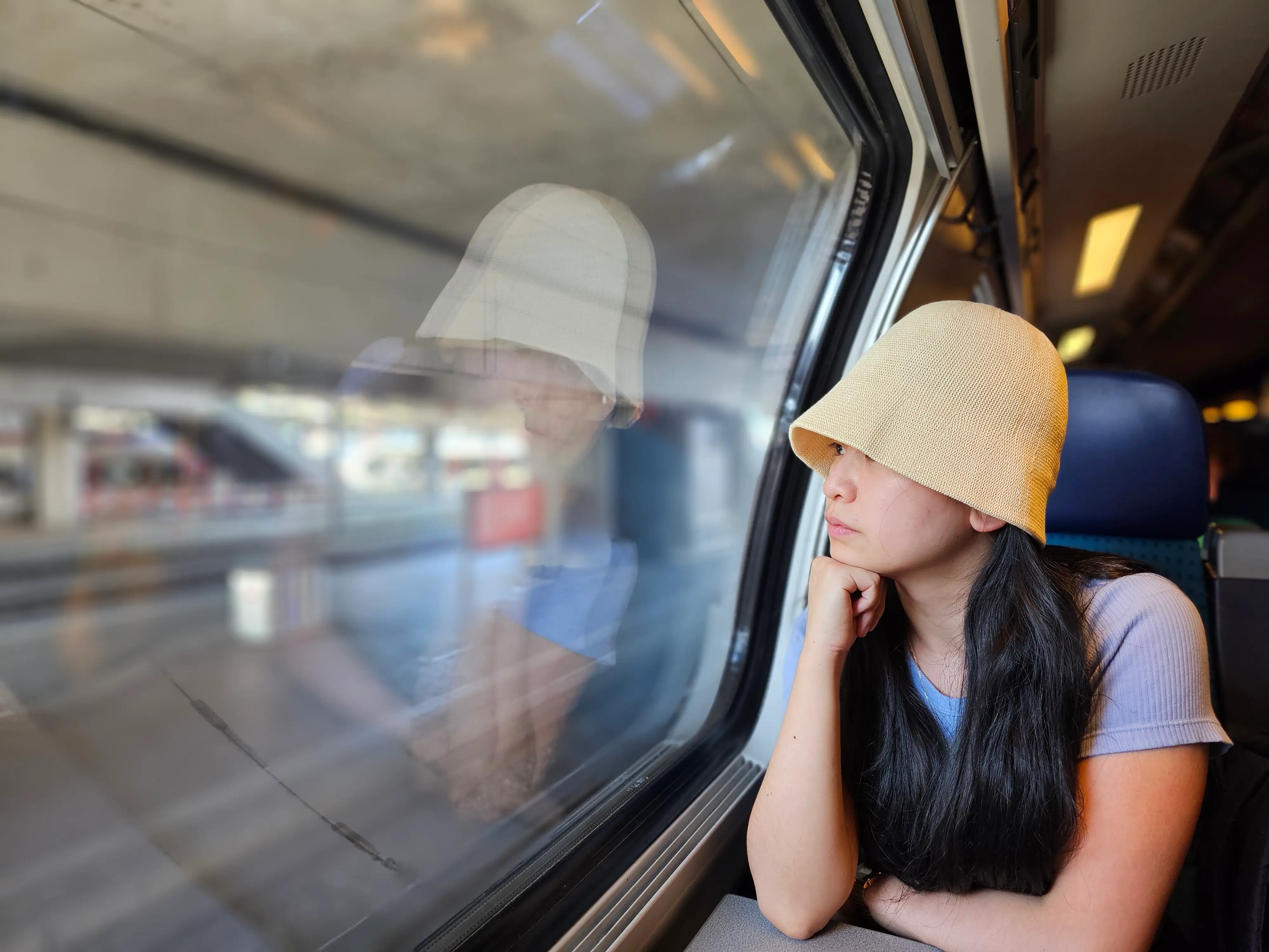 Vivienne Zhao is sitting on a train in Paris, France.
