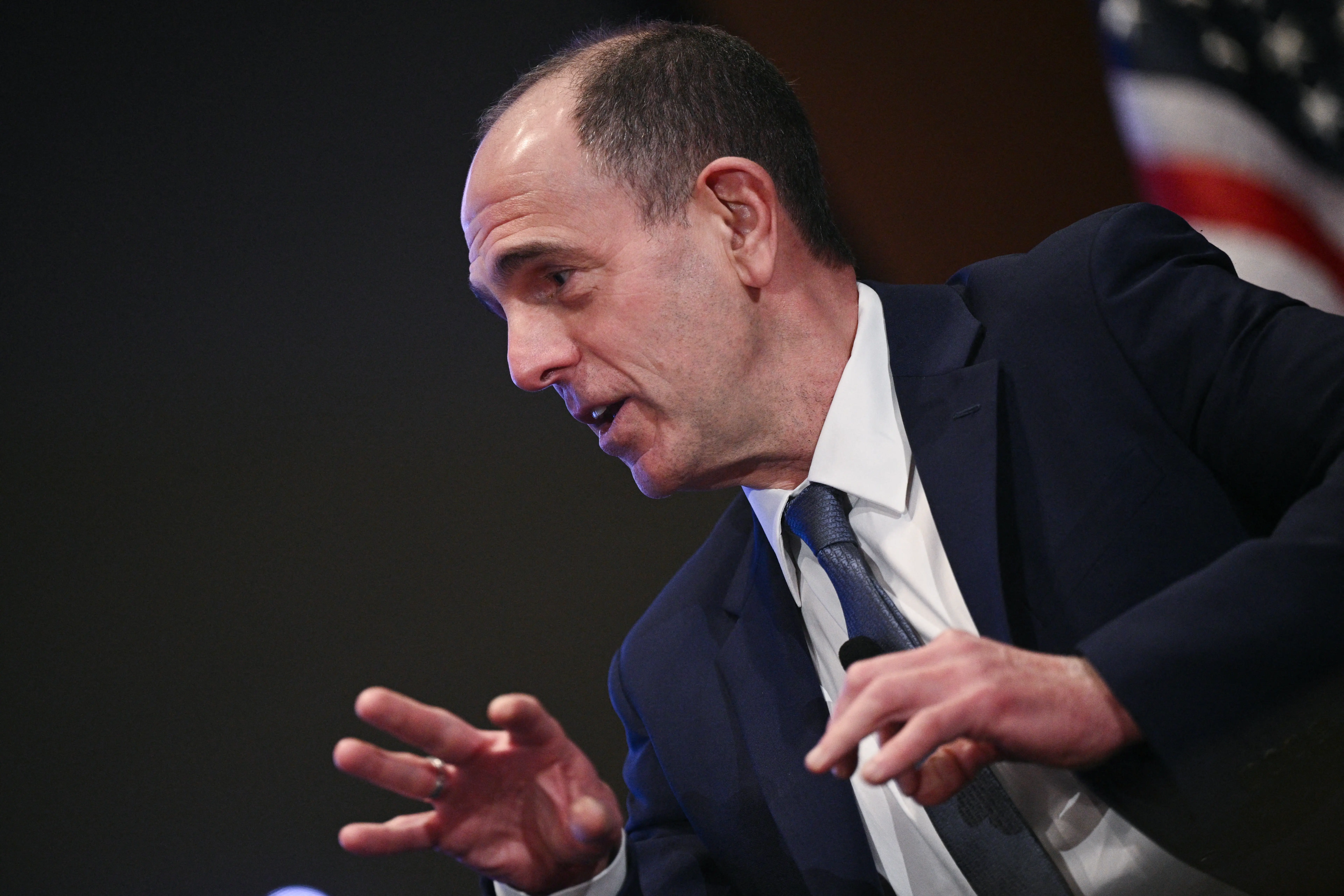 Khosla Ventures Managing Director Keith Rabois speaks during a forum with the US flag visible behind him.