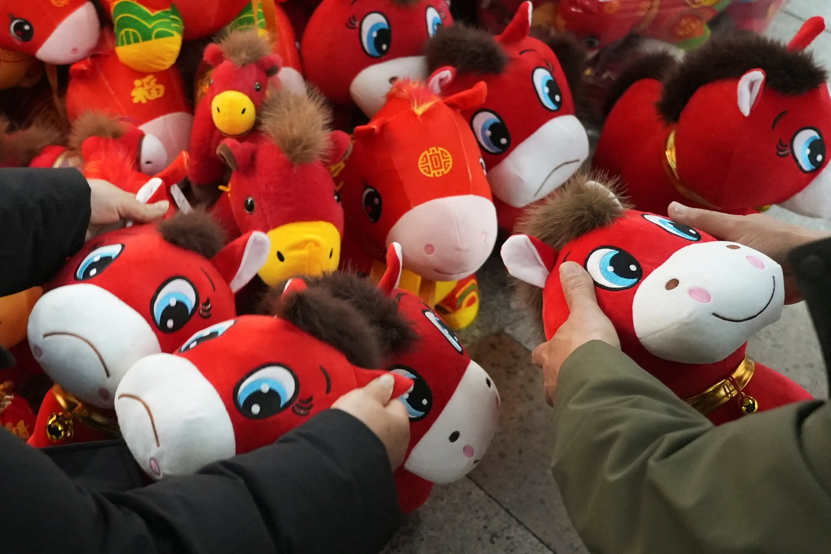 Horse toys ahead of Lunar New Year in China.