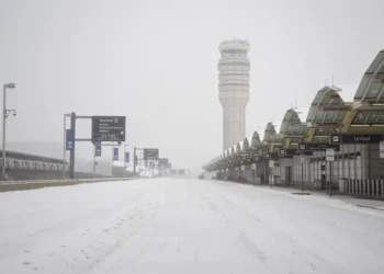Flight cancellation numbers are dropping as travel starts to recover after a huge winter storm battered the US