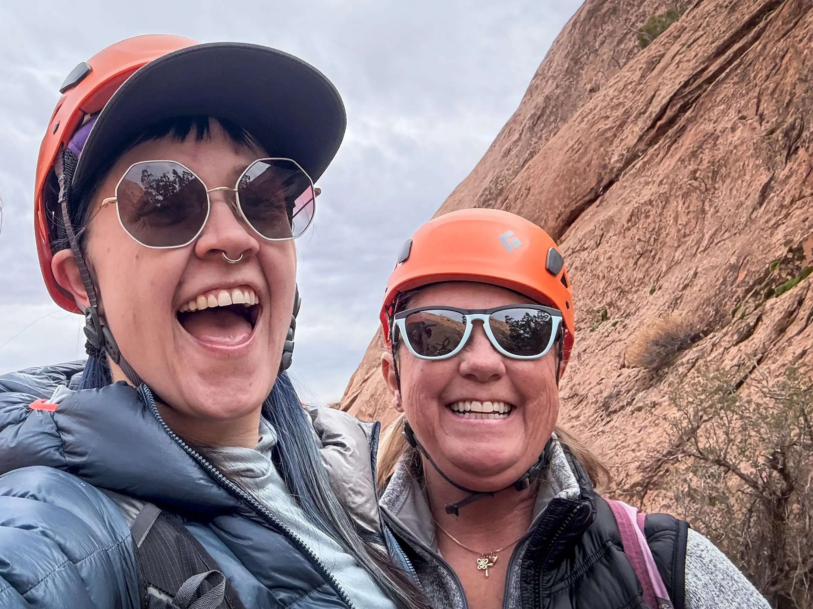 Author, her mom, and tour guide in canyon taking selfie