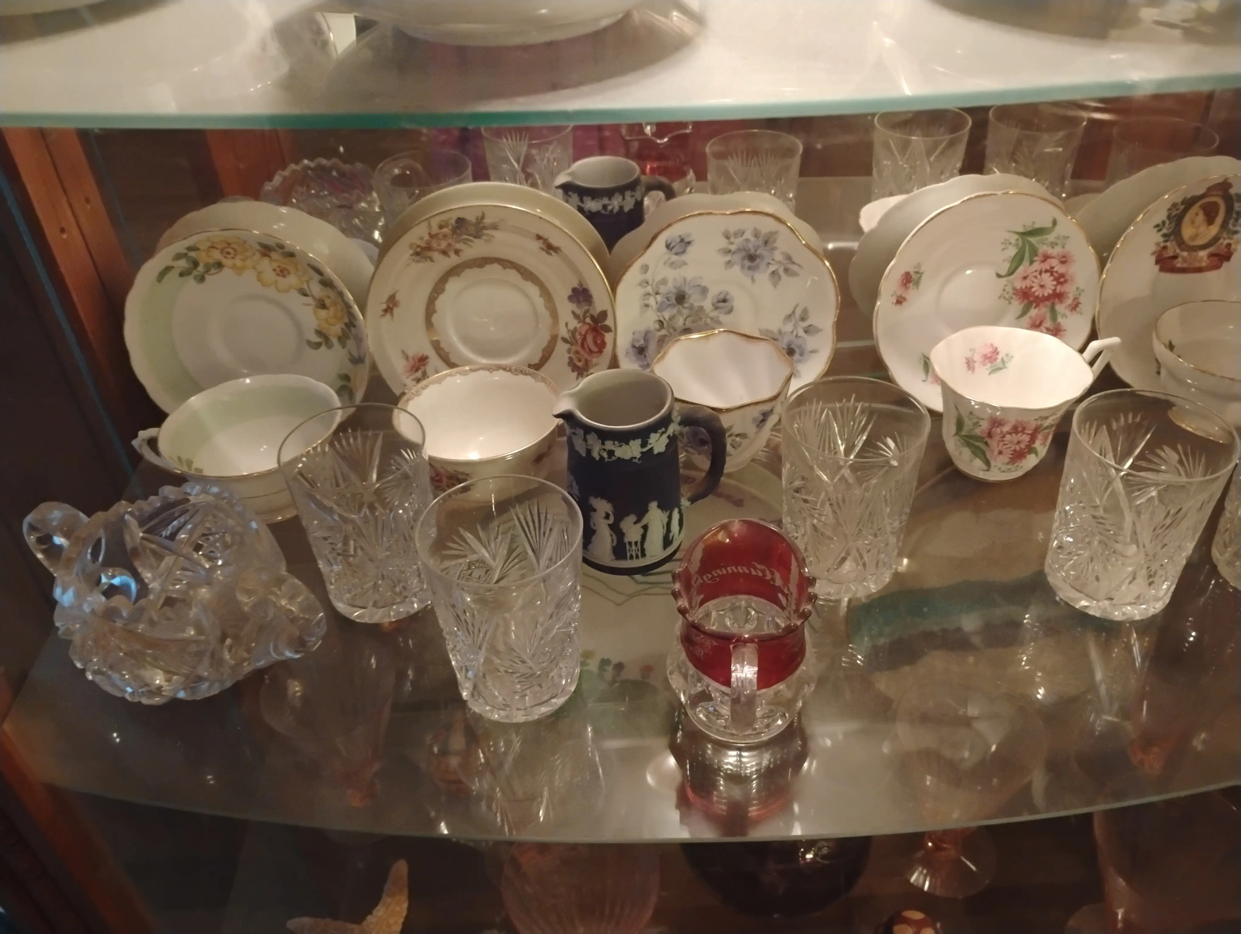 Cynthia Wall's china sets in a case