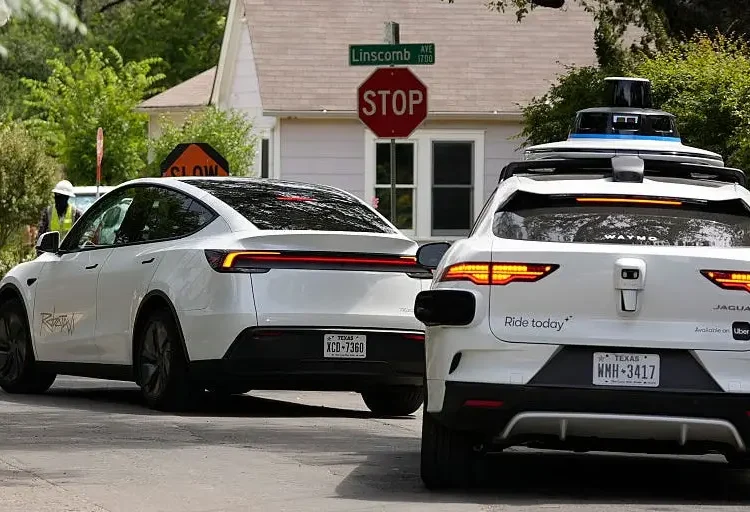 Robotaxi report card: Waymo is getting more competitive with Uber and Lyft, while Tesla undercuts everyone on price