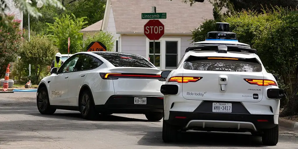 Robotaxi report card: Waymo is getting more competitive with Uber and Lyft, while Tesla undercuts everyone on price