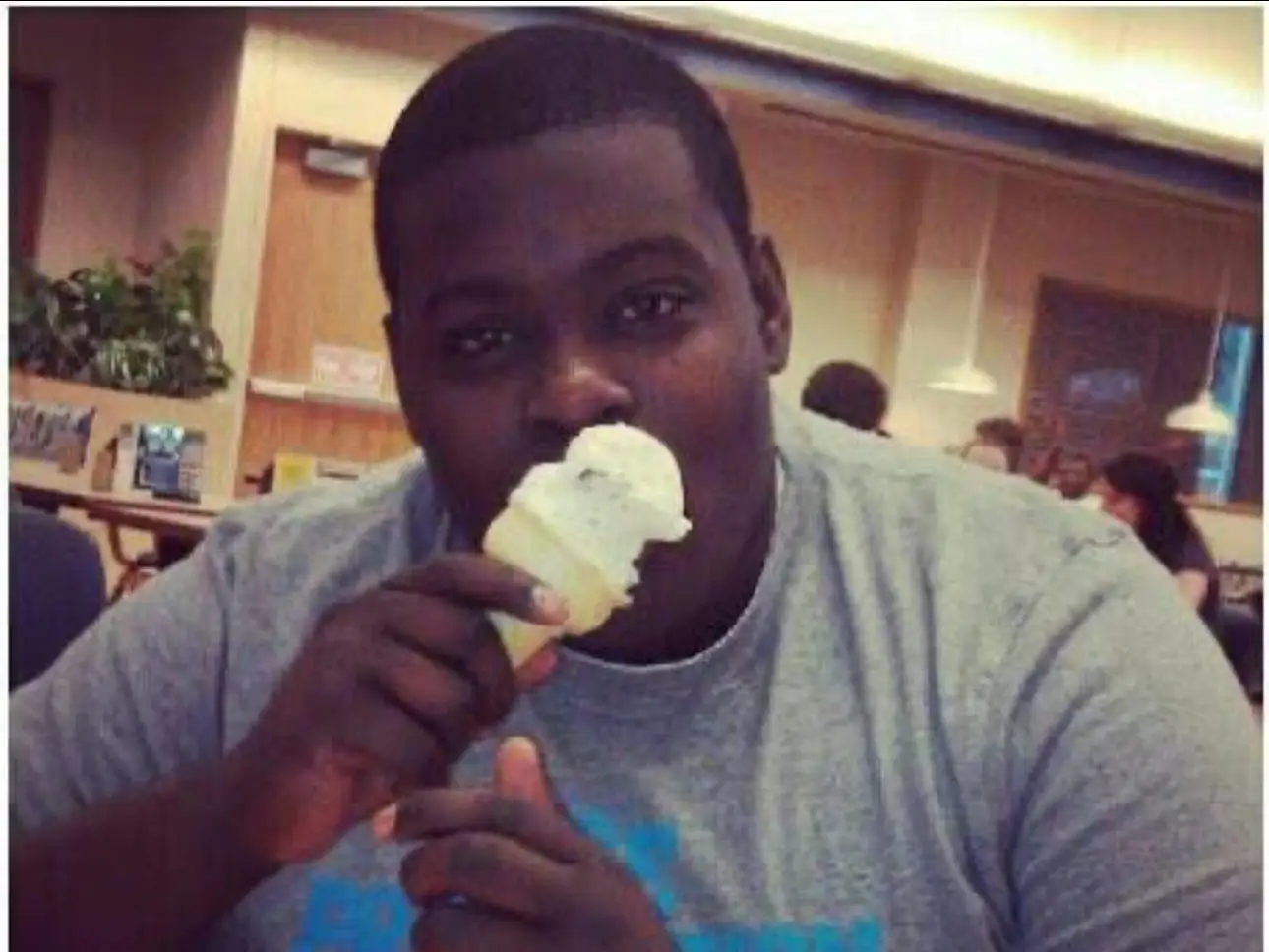 A man eating an ice cream