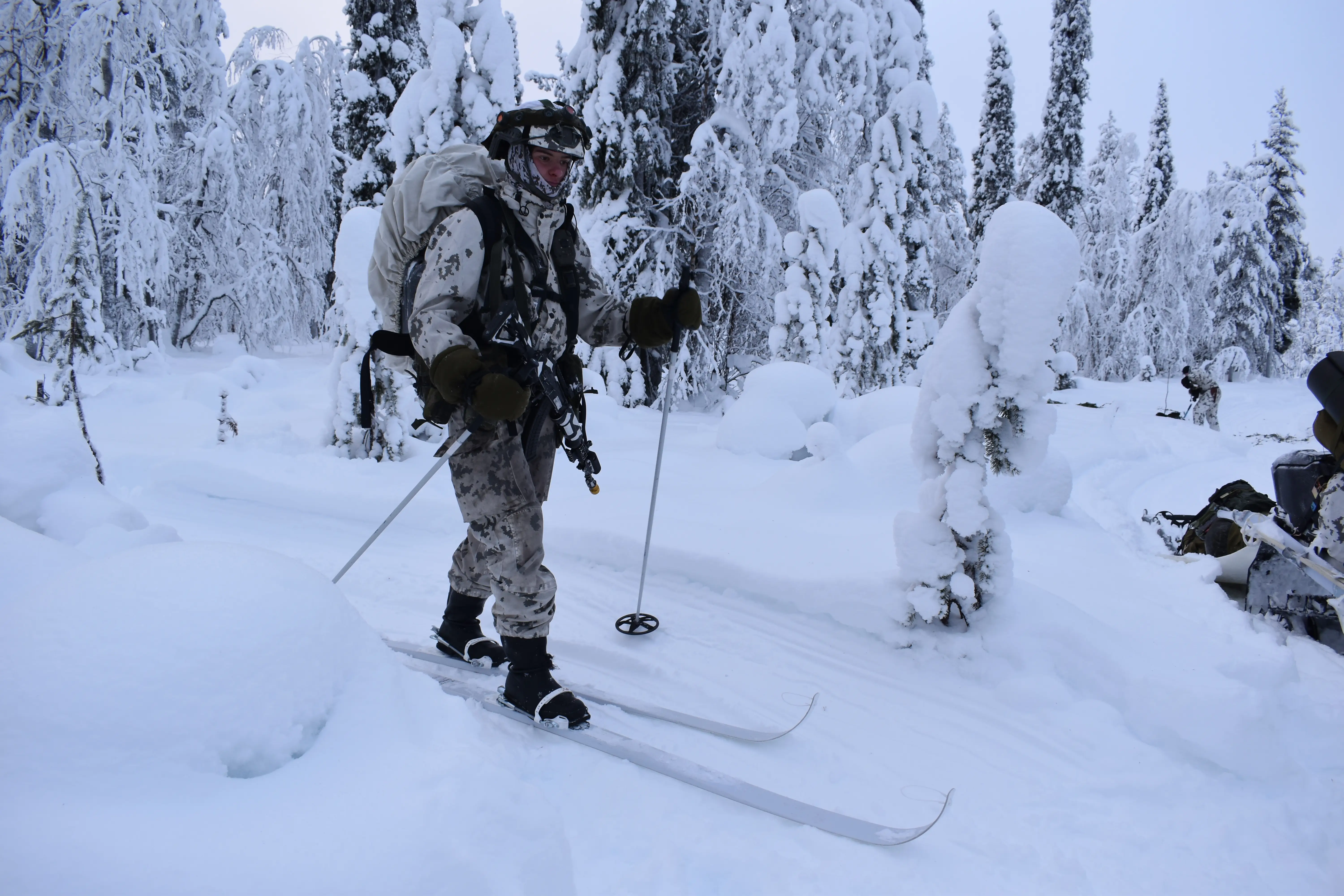 A Finnish soldier walks on her skis in northern Finland in January 2026.