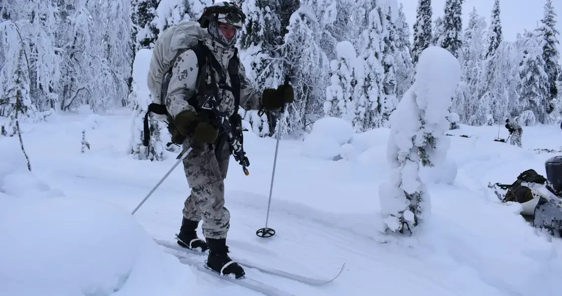 Snowmobiles, skis, and laser tag: How NATO soldiers train for Arctic assaults