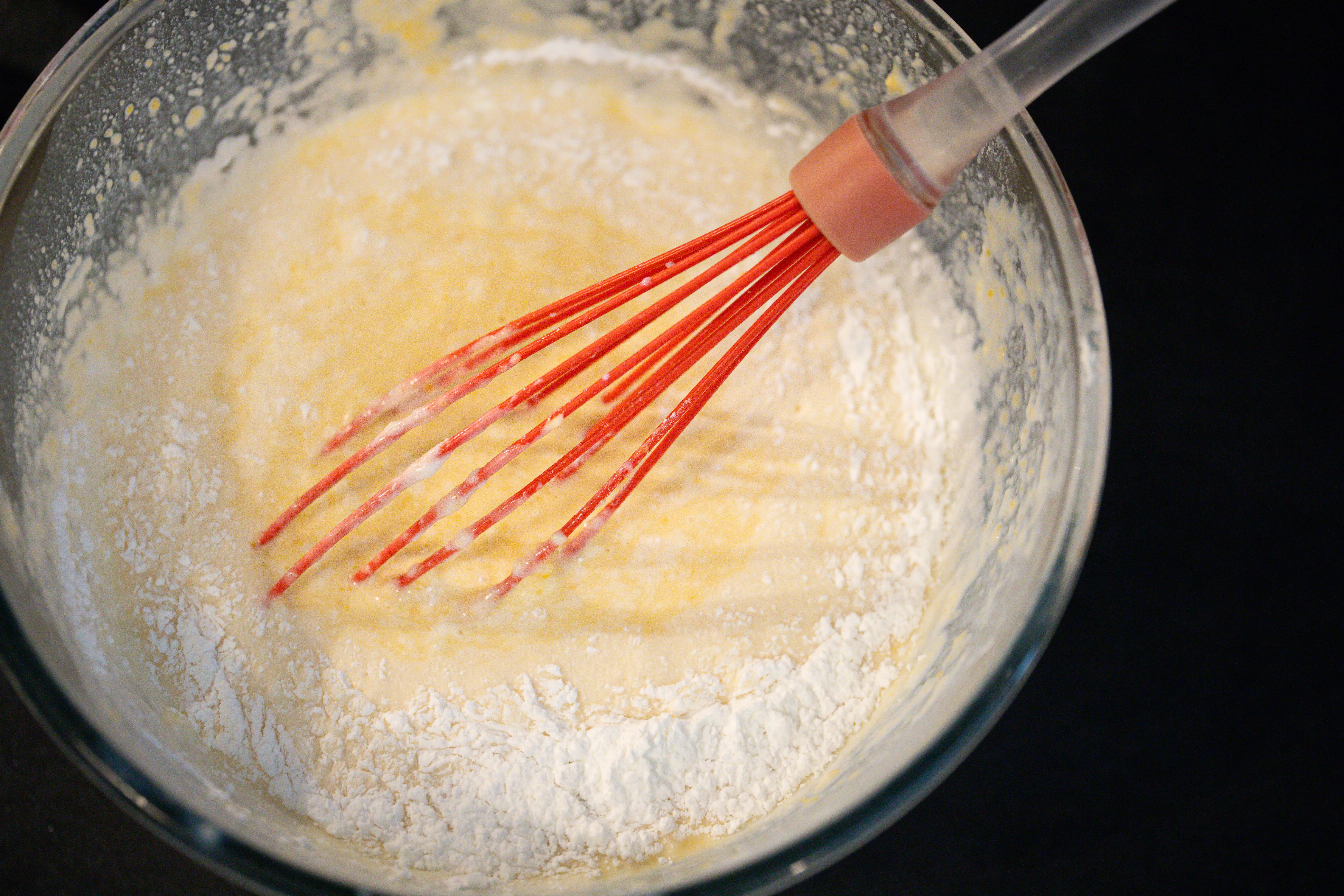 Whisk in bowl of flour, batter
