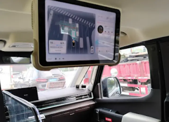 Interior of a WeRide robotaxi in Beijing with a voice- and touch-controlled screen