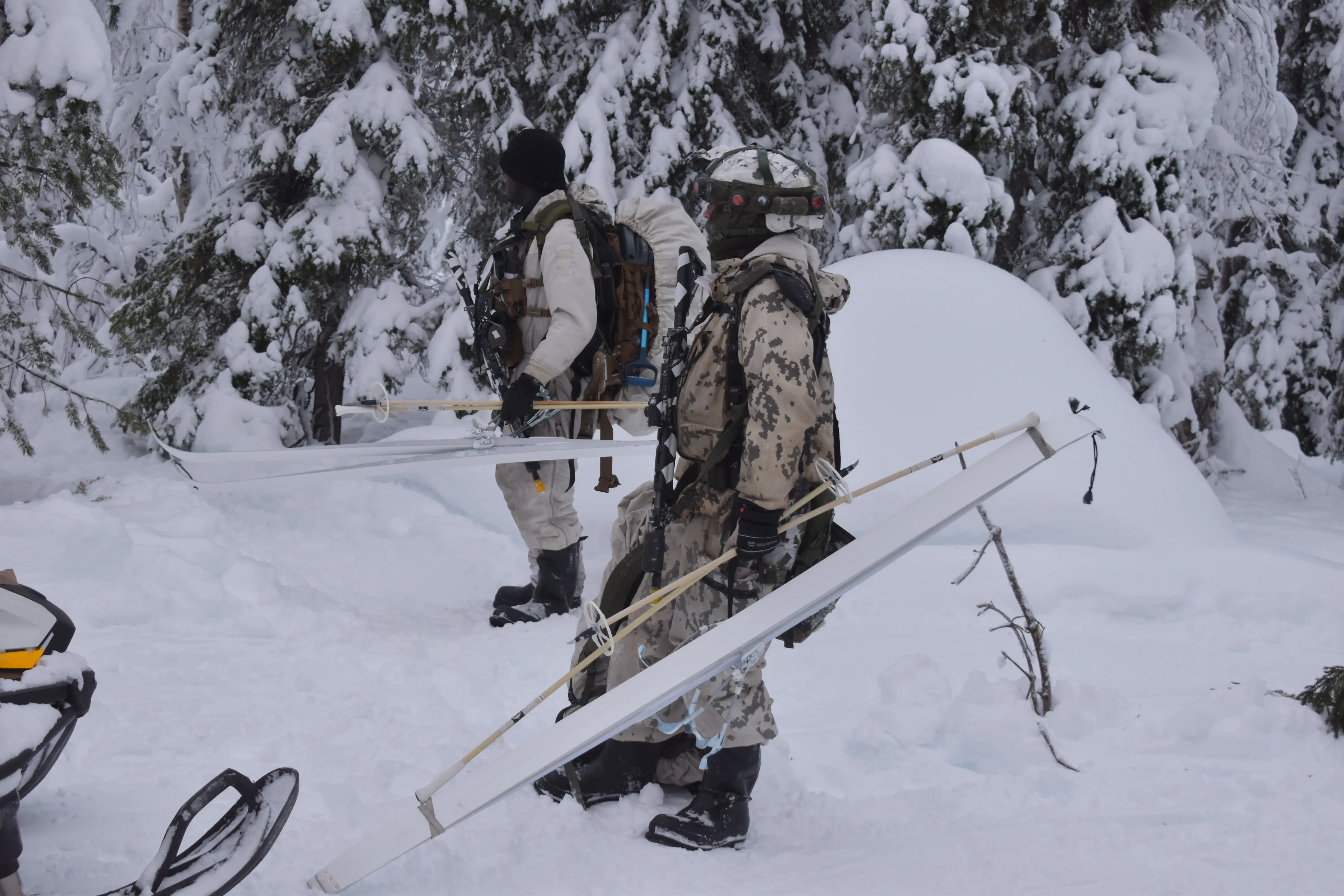 NATO soldiers hold their skis in northern Finland in January 2026.