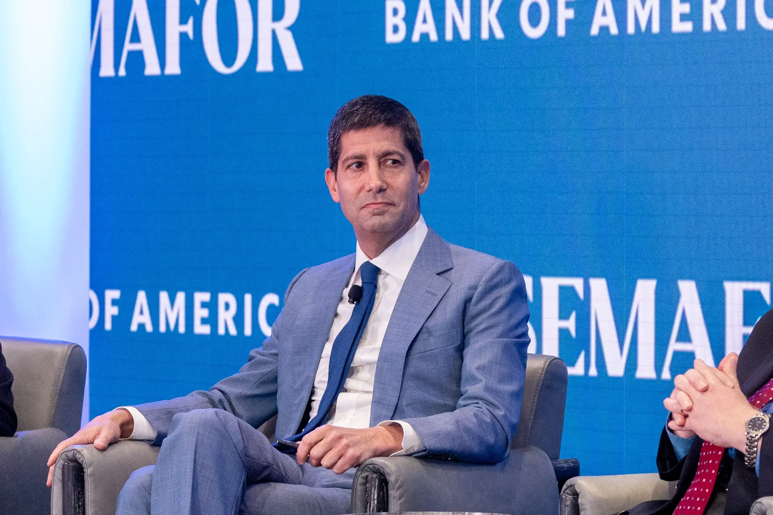 US Federal Reserve Chair Kevin Warsh listening to other people speak on a Bank of America and Semafor panel.