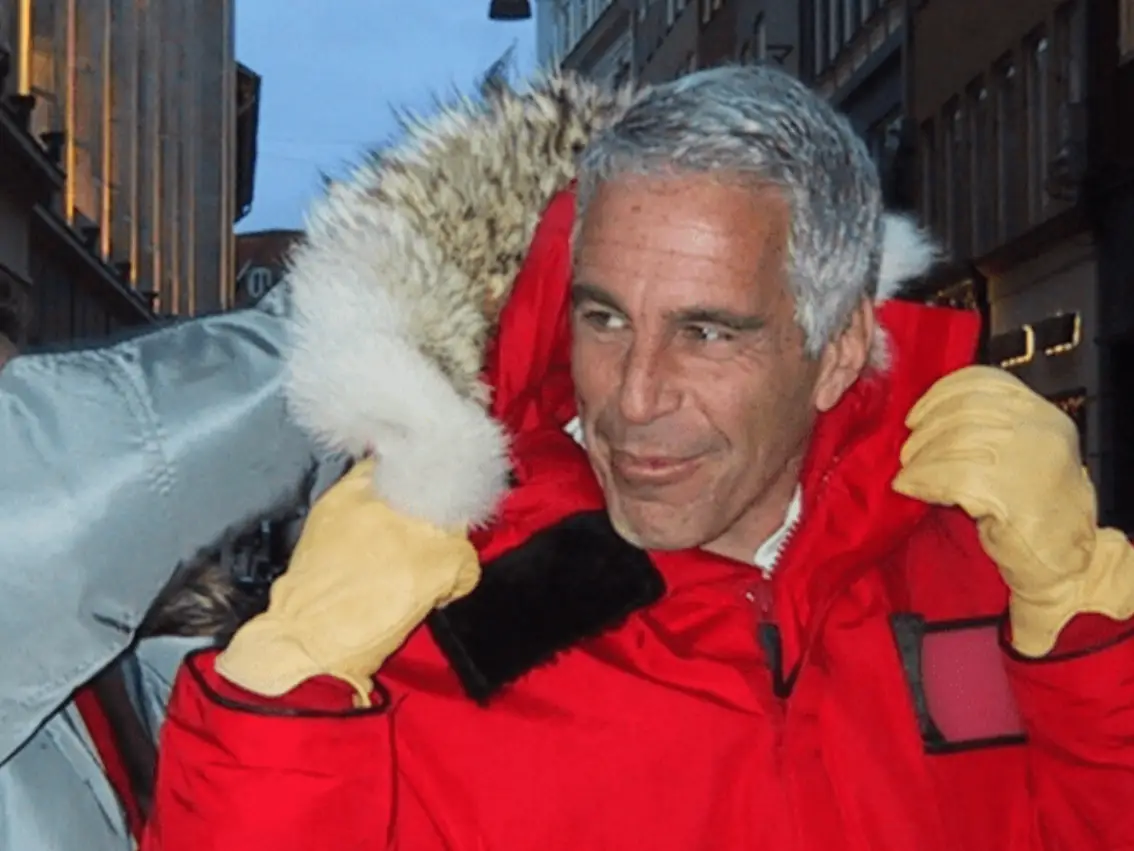 Jeffrey Epstein in a red coat.