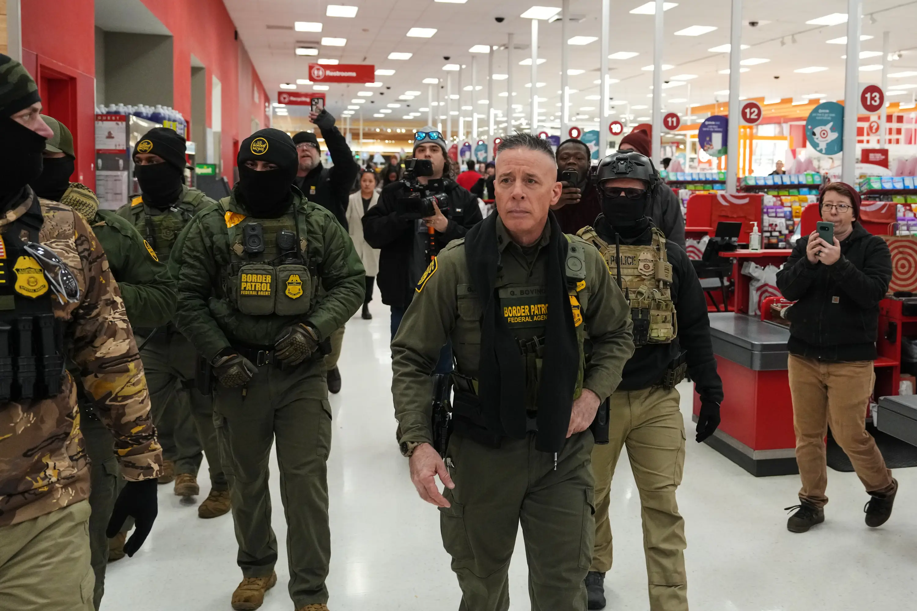 U.S. Border Patrol Cmdr. Gregory Bovino walks through a Target store Sunday, Jan. 11, 2026, in St. Paul, Minn.