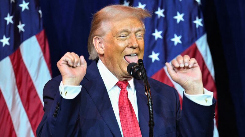 US President Donald Trump reacts as he speaks during the House Republican Party (GOP) member retreat at the Kennedy Center in Washington, DC, on January 6, 2026. (Photo by Mandel NGAN / AFP via Getty Images)