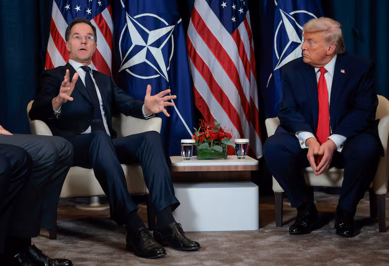 President Donald Trump listens as NATO Secretary General Mark Rutte speaks during a bilateral meeting on the sidelines of the World Economic Forum Annual Meeting on January 21, 2026 in Davos, Switzerland.
