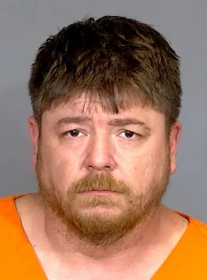 Mugshot of Cecil Mains.