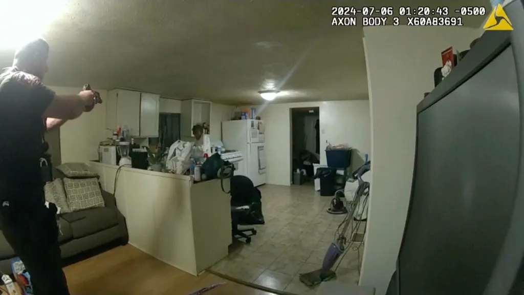 Body camera video of former Sangamon County Sheriff's Deputy Sean Grayson pointing a gun at Sonya Massey in her home.