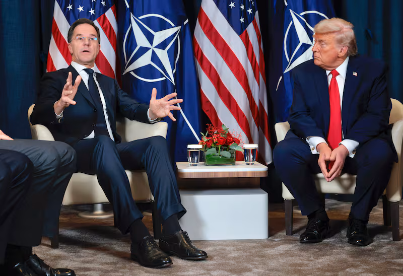 DAVOS, SWITZERLAND - JANUARY 21: U.S. President Donald Trump (R) listens as NATO Secretary General Mark Rutte speaks during a bilateral meeting on the sidelines of the World Economic Forum (WEF) Annual Meeting on January 21, 2026 in Davos, Switzerland. The annual meeting of political and business leaders comes amid rising tensions between the United States and Europe over a range of issues, including Trump's vow to acquire Greenland, a semi-autonomous Danish territory. (Photo by Chip Somodevilla/Getty Images)