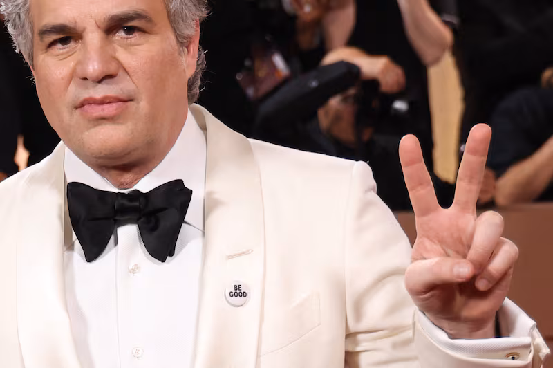 US actor Mark Ruffalo US wears a pin reading "be Good", in tribute to Renee Good, who was fatally shot by a US Immigration and Customs Enforcement (ICE) agent in Minneapolis, as he attends the 83rd annual Golden Globe Awards at the Beverly Hilton hotel in Beverly Hills, California, on January 11, 2026.