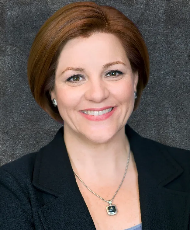 Headshot of Christine Quinn.