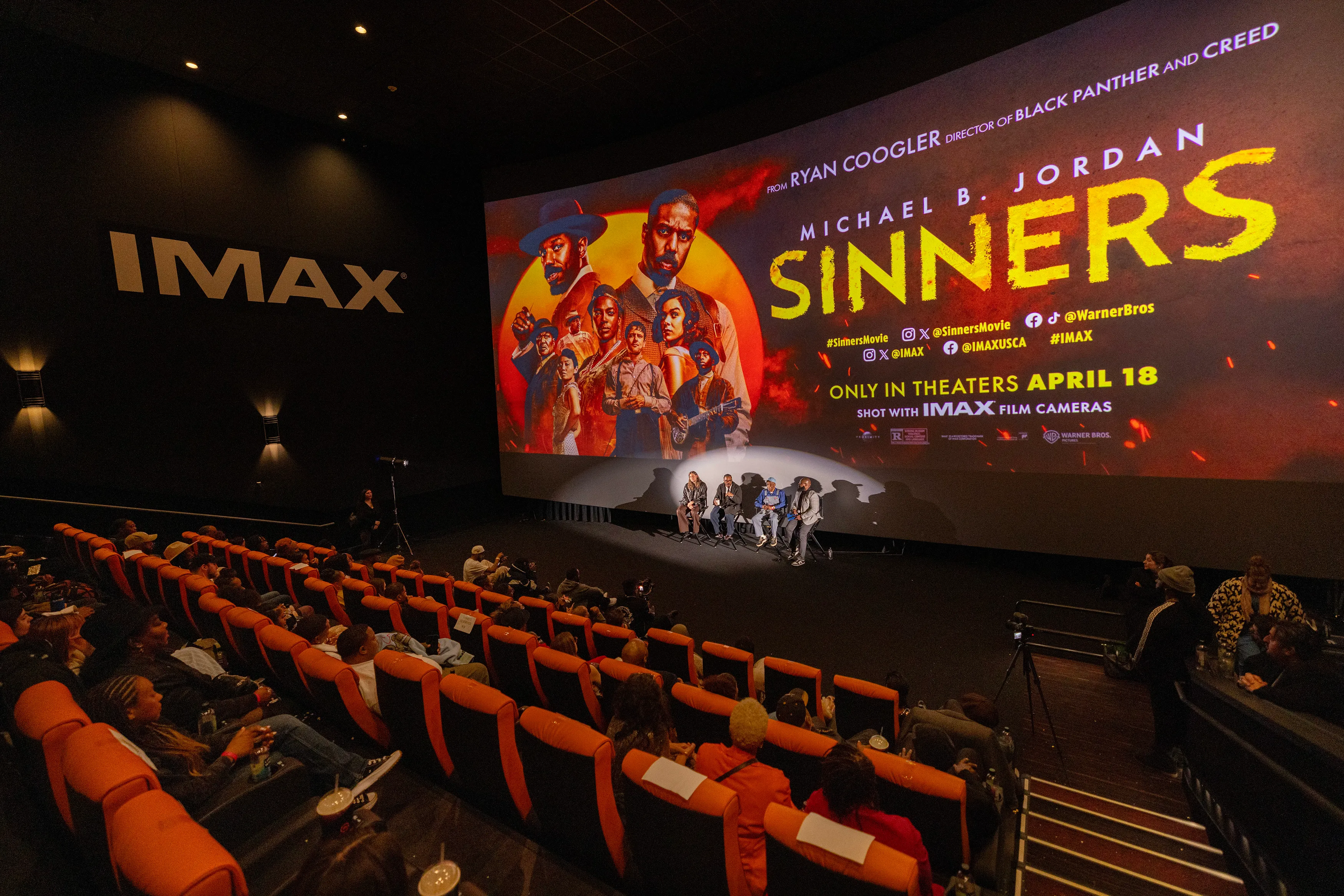 Moviegoers file in for an IMAX screening of Sinners