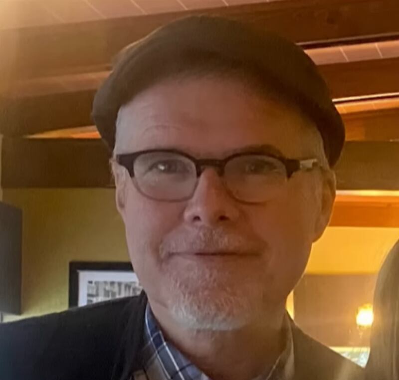 A close-up photo of Dennis Coyle.