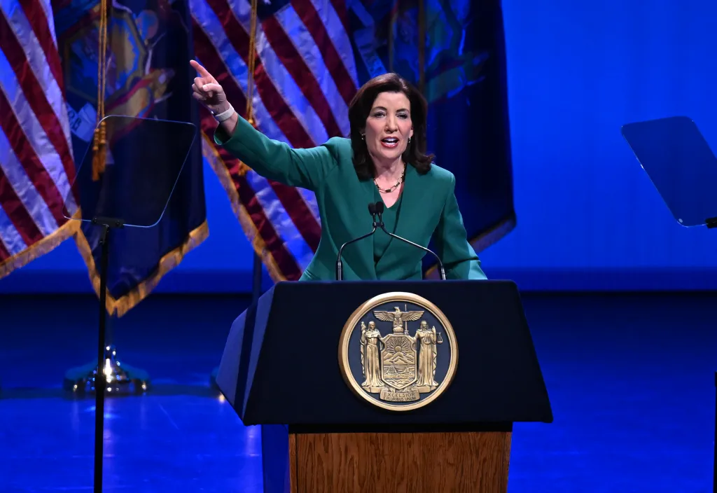 Gov. Kathy Hochul’s 2026 “State of the State” agenda is set to include limits on ICE activity at “sensitive locations,” pilot programs for autonomous vehicles in upstate cities, a new downstate semiconductor chip design center, and another tuition freeze for CUNY and SUNY schools.