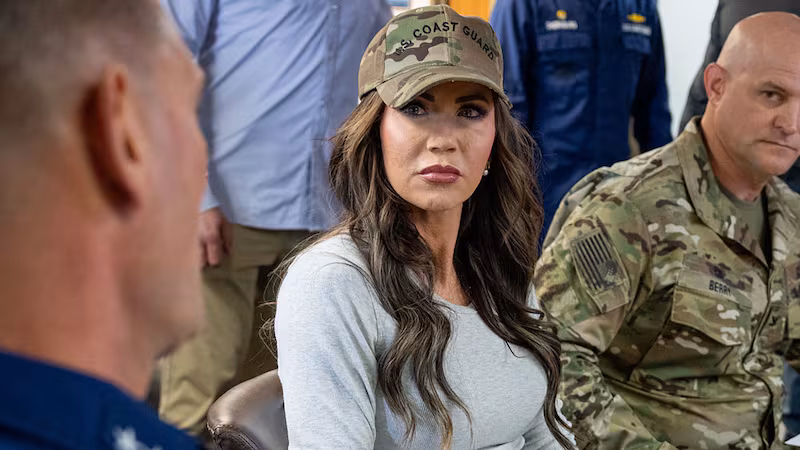 Department of Homeland Security Secretary Kristi Noem speaks with U.S. Coast Guard Rear Admiral Joseph Buzzella in San Diego, Calif., March 16, 2025.