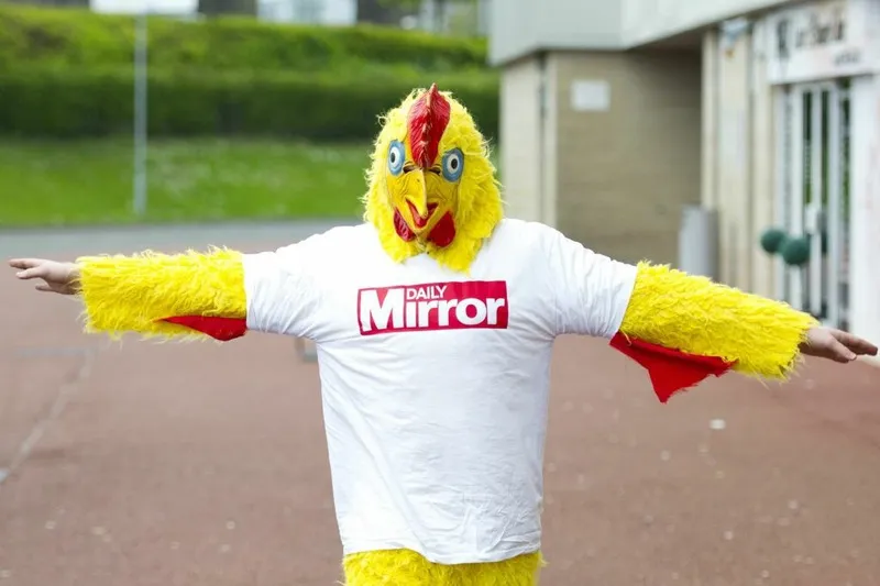 Smith dressed as a giant chicken and stalked Farage through the streets