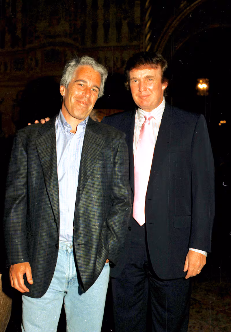 Jeffrey Epstein (left) and Donald Trump as they pose together at the Mar-a-Lago estate, Palm Beach, Florida on February 22, 1997.