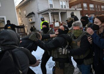 ICE and activists clash over doxing and privacy, in court and streets