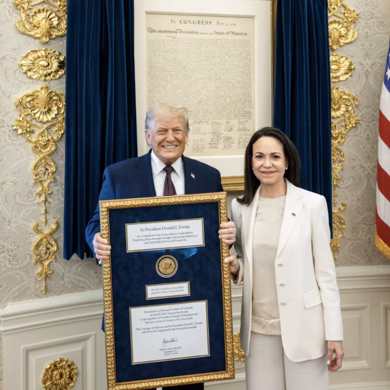 Venezuelan opposition leader Maria Corina Machado presents Donald Trump with her Nobel Peace Prize.