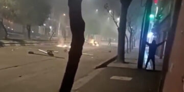 Iranian forces massacred protesters fleeing burning market, witnesses say