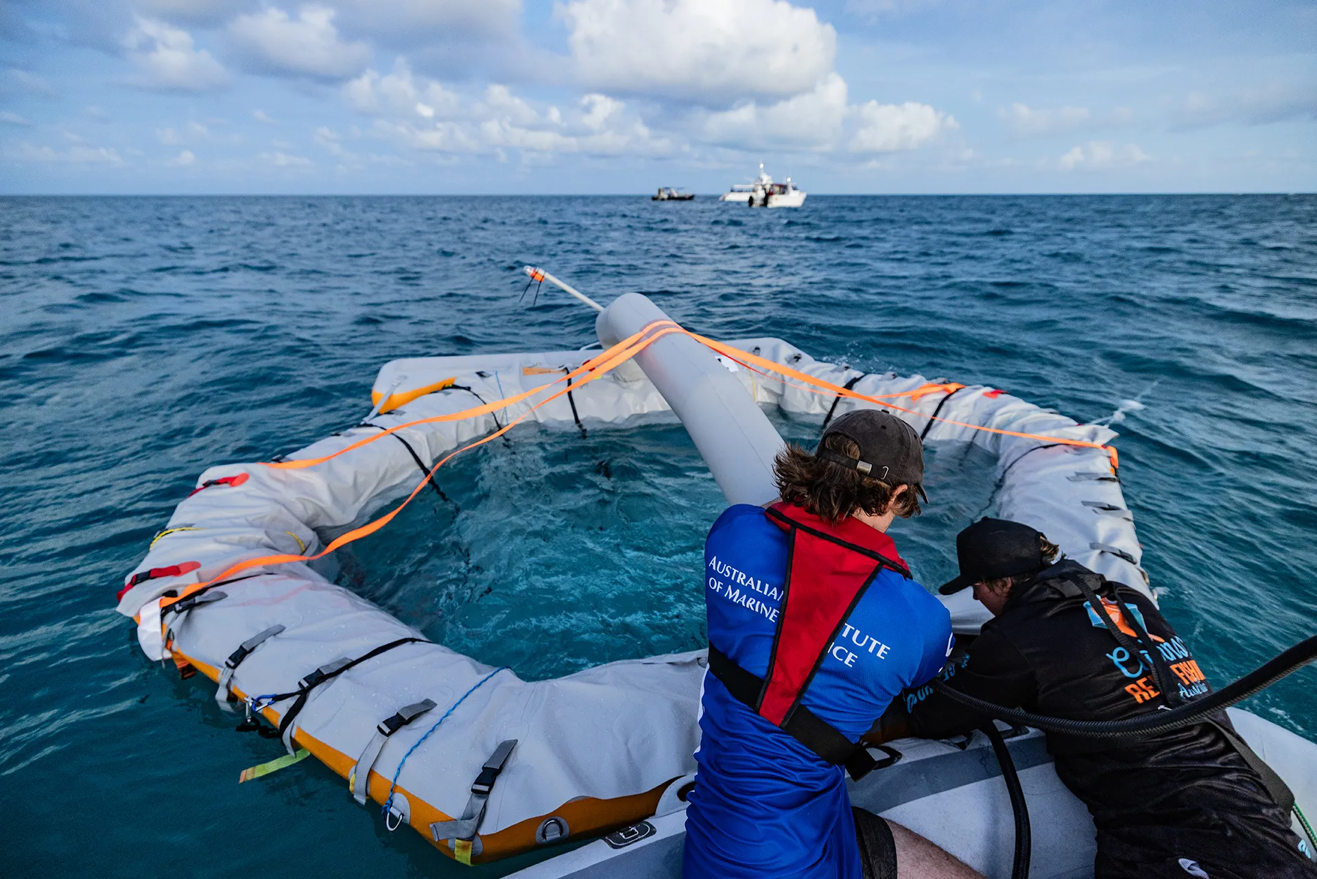 Two people pump a pool