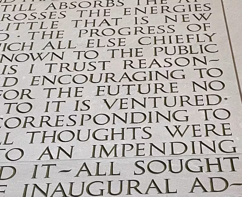 On the north interior wall of the chamber, President Abraham Lincoln's Second Inaugural Speech is carved into the limestone. Delivered on March 4, 1865, the eloquent speech gives Lincoln's perspective on his first term and the terrible Civil War that was consuming the nation before looking forward to the war's coming end. It's ironic then that there's a flaw in the future. The actual word 