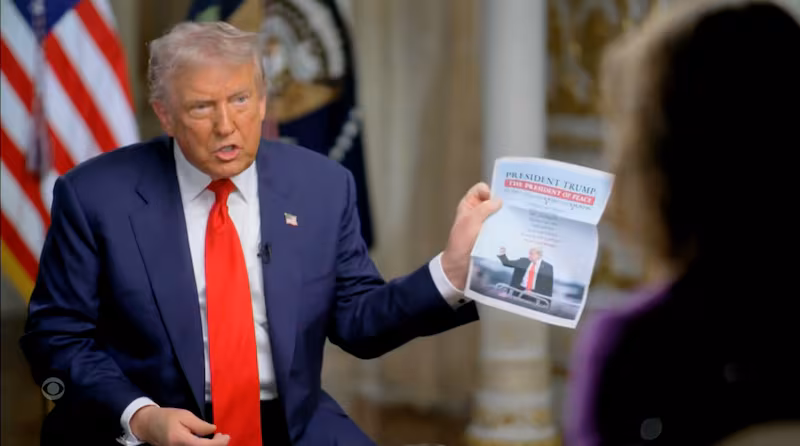 Trump brandishes his list of "resolved" conflicts.