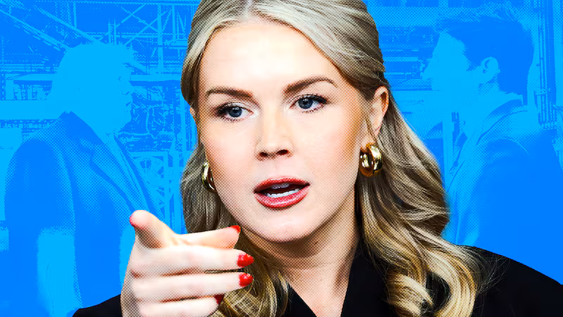 Karoline Leavitt standing in front of the CBS interview of Donald Trump