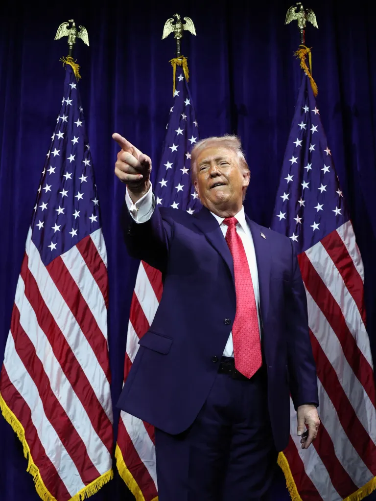 President Trump gestures as he addresses House Republicans at their annual issues conference retreat, at the Kennedy Center, renamed the Trump-Kennedy Center by the Trump-appointed board of directors, in Washington, on Jan. 6, 2026.