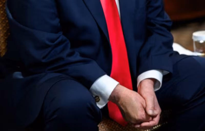 Close-up of Trump's make-up covered hand at the White House.