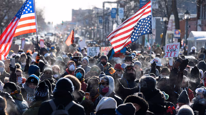 Protesters gather near where a man was shot dead by federal immigration agents in Minneapolis, Minnesota, on January 24, 2026.